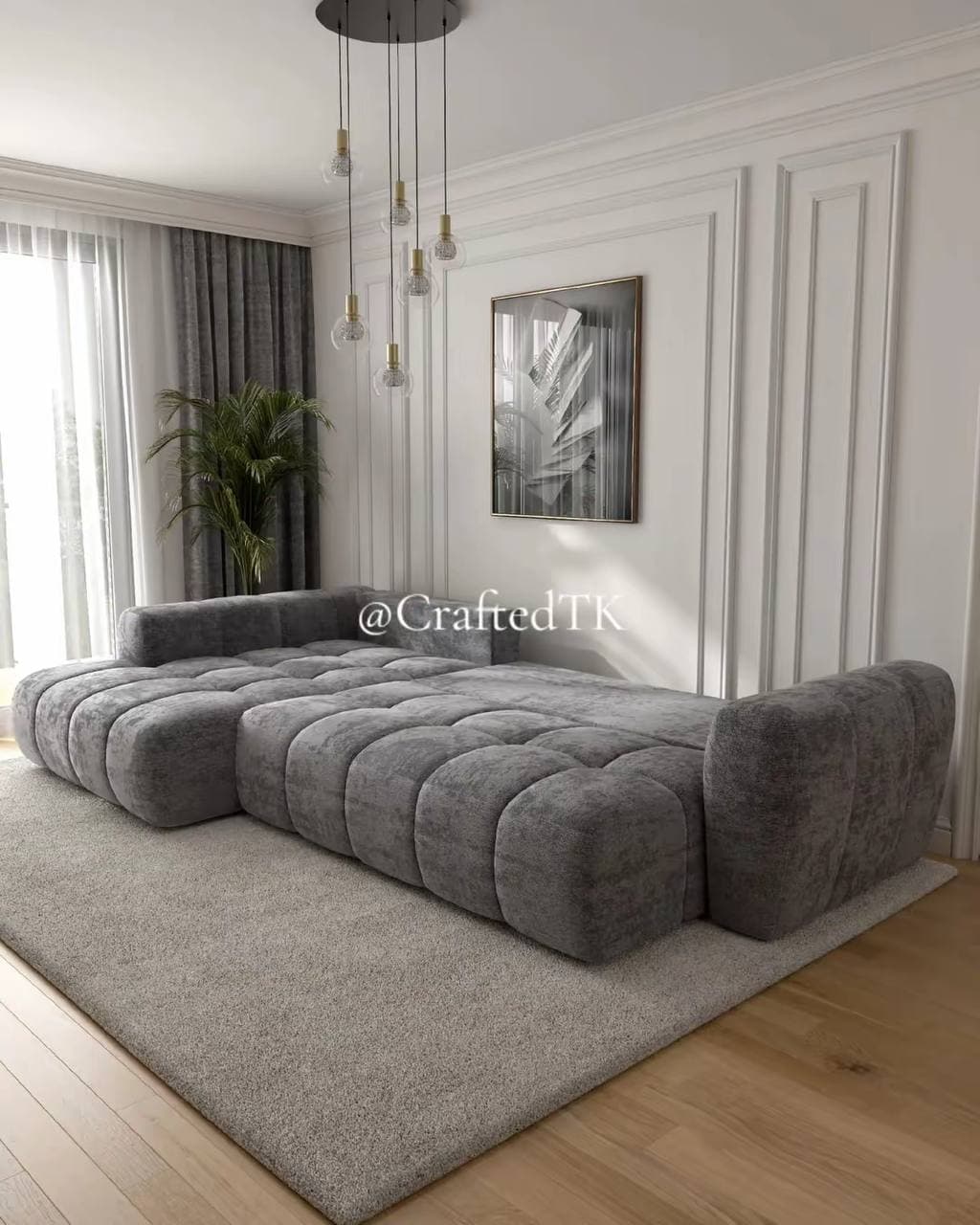 Grey bubble-tufted modular sectional sofa in a panelled living room