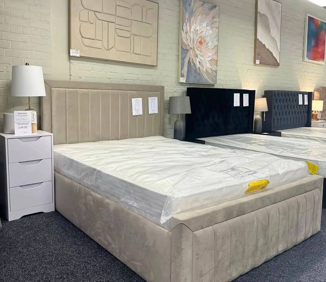 Beige velvet upholstered bed frame with panelled headboard