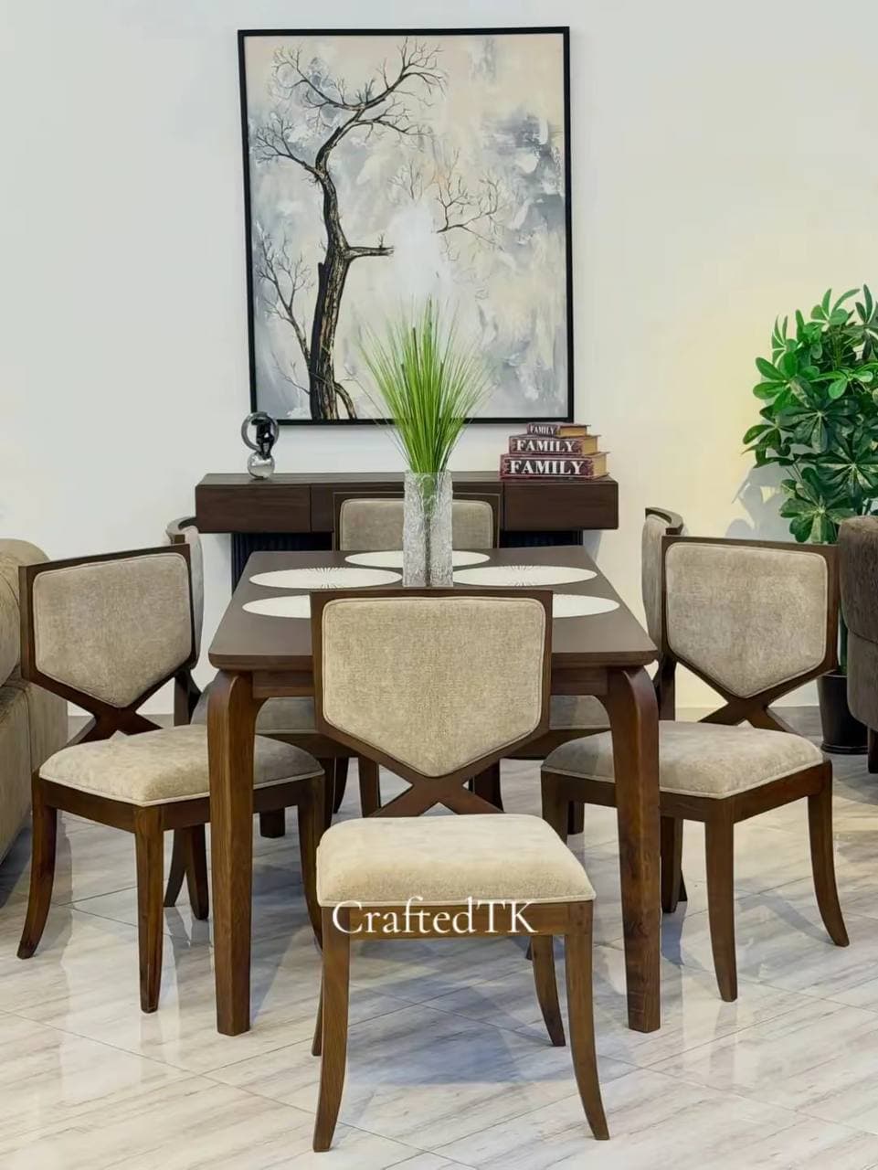 Walnut dining table with six upholstered cross-back chairs